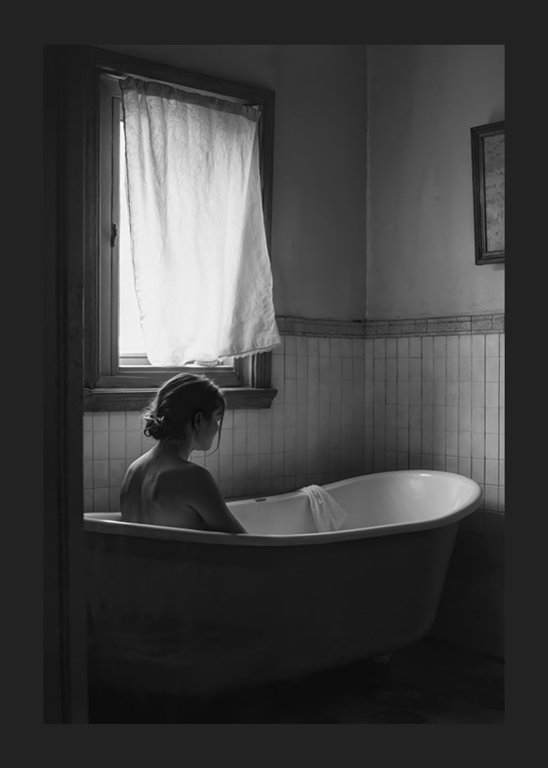 A poster with a woman sitting in her bathtub and thinking-12