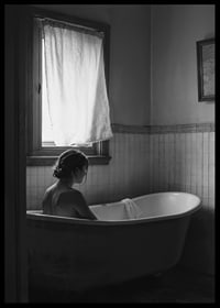 A poster with a woman sitting in her bathtub and thinking-6