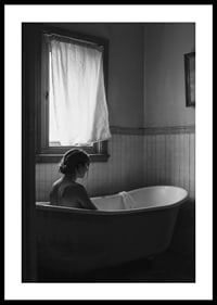A poster with a woman sitting in her bathtub and thinking-0