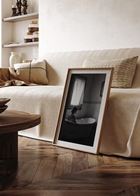 A poster with a woman sitting in her bathtub and thinking-8