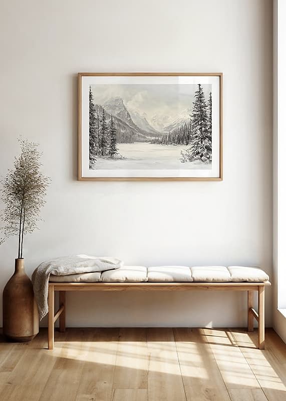 Une affiche représentant des montagnes enneigées et une vallée paisible, encadrées par des sapins majestueux-12