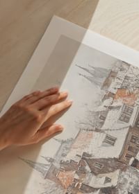 A poster showing a picturesque town with snow-covered roofs and church steeples in the stillness of winter-5