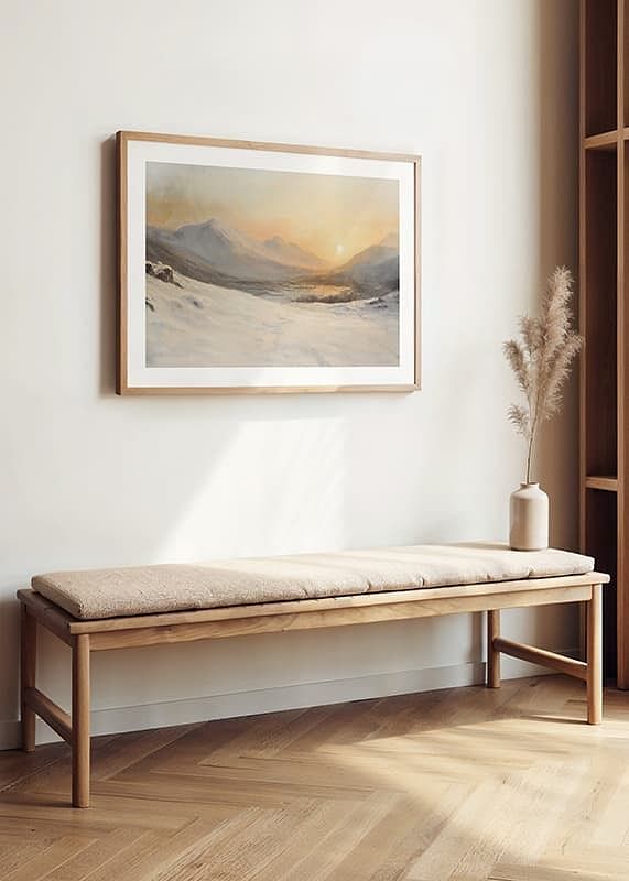 A poster depicting a snow-covered mountain landscape in the warm, golden light of sunset-12