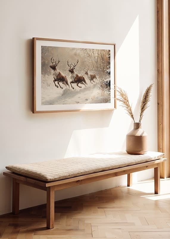 A poster of reindeer galloping through a snow-covered landscape.-12