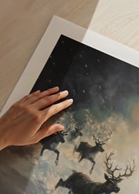 A poster of reindeer rushing down a snow-covered slope.-9