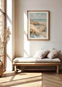A poster of a sunny beach with sand dunes and a sparkling ocean in the background-8