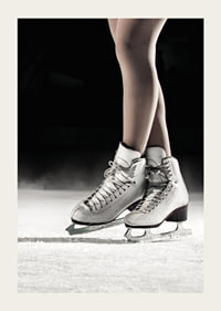 A pair of elegant figure skates stand poised on the ice, ready to create magic with every move-3