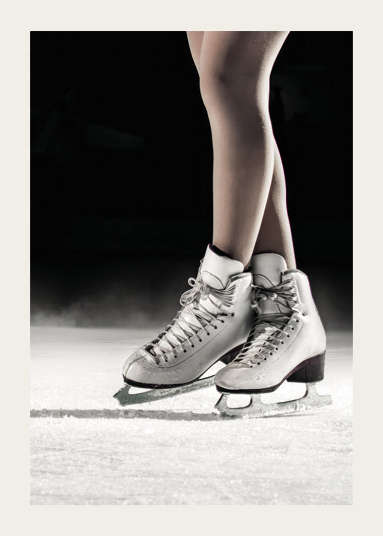 A pair of elegant figure skates stand poised on the ice, ready to create magic with every move-12
