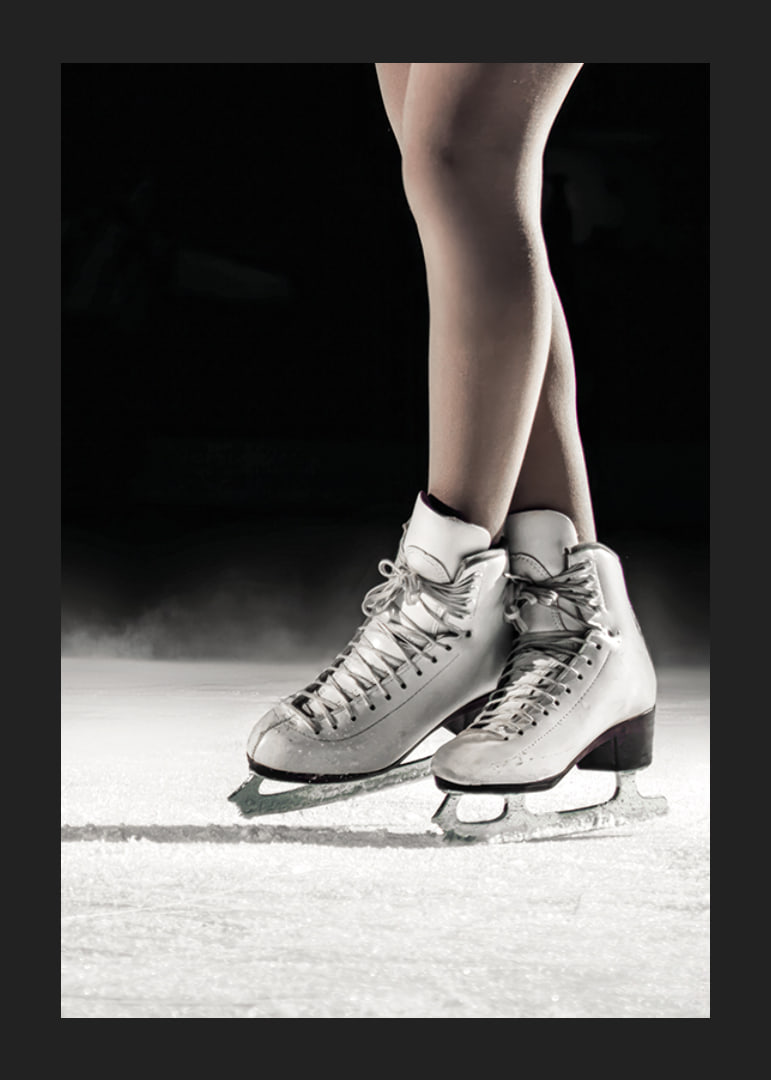 A pair of elegant figure skates stand poised on the ice, ready to create magic with every move-12
