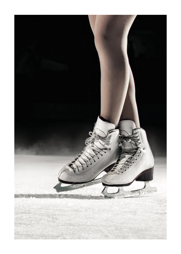 A pair of elegant figure skates stand poised on the ice, ready to create magic with every move-12