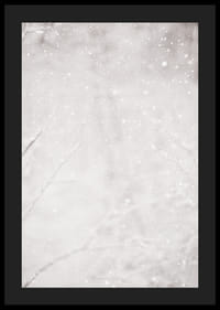 Soft snowflakes fall through a silent winter landscape, creating a sense of calm and magic-4