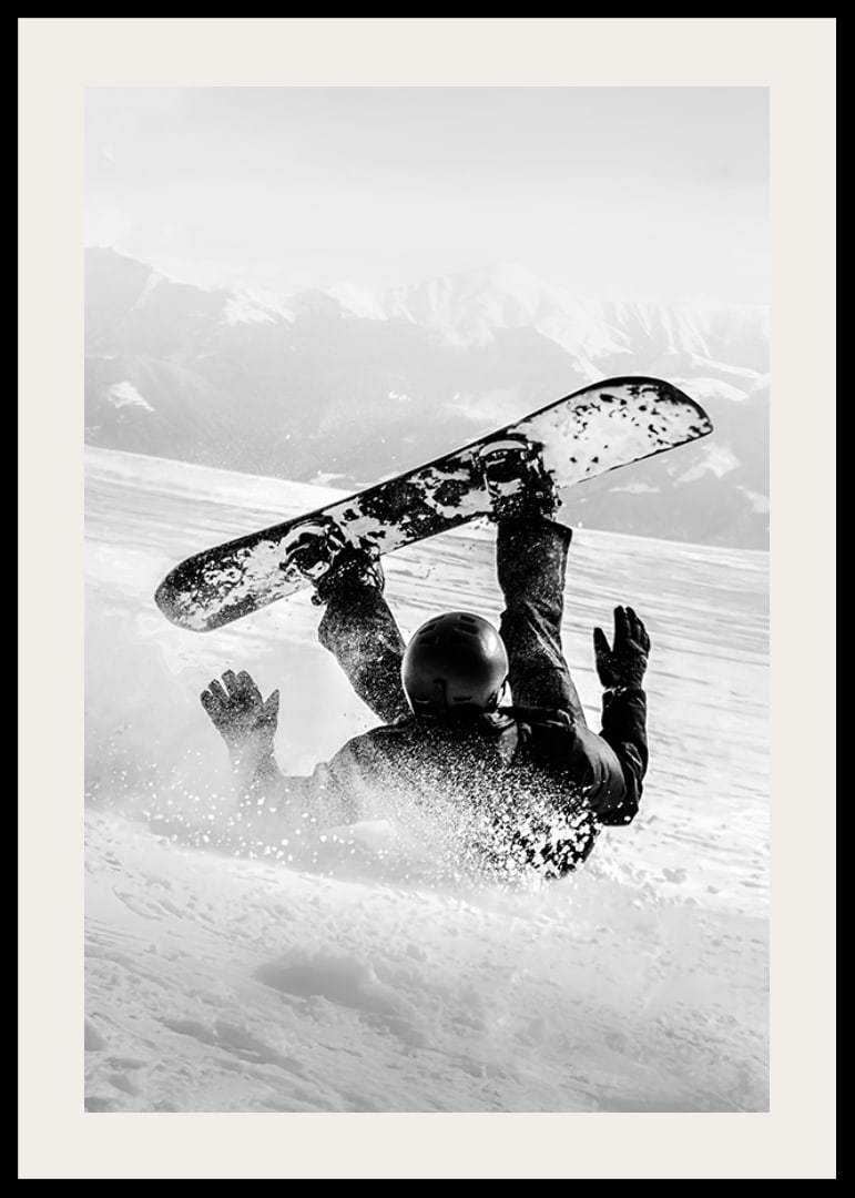 A dramatic moment of snowboarding adventure where a skier meets both speed and fall in snow-covered mountains.-12