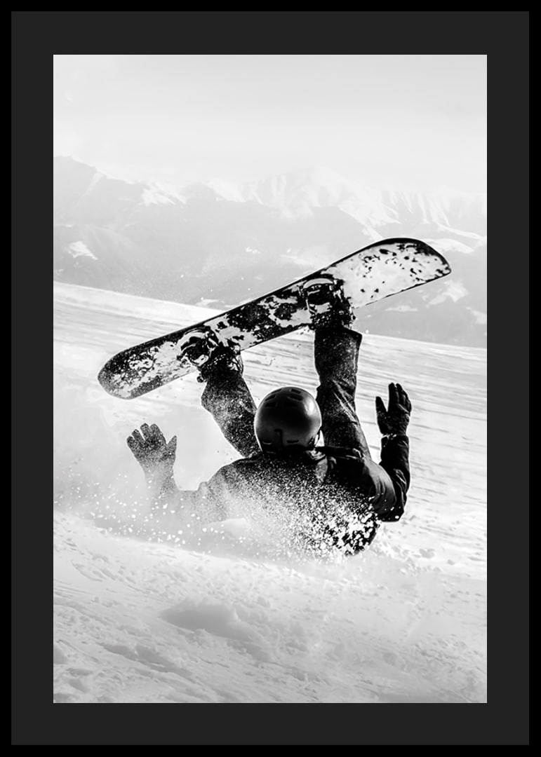 A dramatic moment of snowboarding adventure where a skier meets both speed and fall in snow-covered mountains.-12