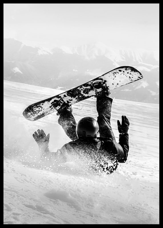 A dramatic moment of snowboarding adventure where a skier meets both speed and fall in snow-covered mountains.-12