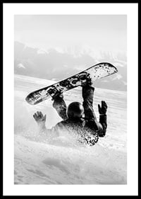 A dramatic moment of snowboarding adventure where a skier meets both speed and fall in snow-covered mountains.-0