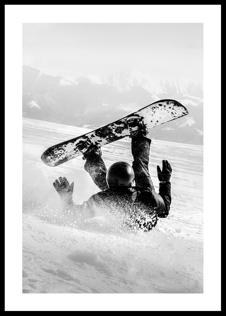 A dramatic moment of snowboarding adventure where a skier meets both speed and fall in snow-covered mountains.-12