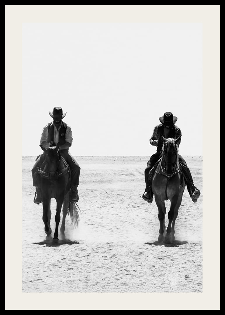 Two cowboys ride side by side through a desolate landscape, framed by the timeless mystery and freedom of the Wild West.-12