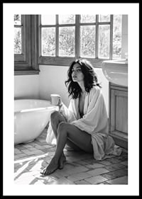 A woman sits in her bathroom with her morning cup and thinks-0