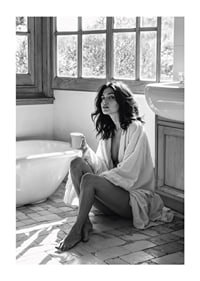 A woman sits in her bathroom with her morning cup and thinks-1