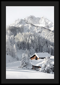 A snow-covered mountain cabin surrounded by frosty trees and majestic mountains that exudes winter idyll and tranquility.-4