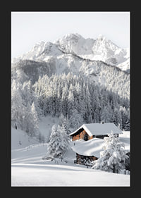 A snow-covered mountain cabin surrounded by frosty trees and majestic mountains that exudes winter idyll and tranquility.-5