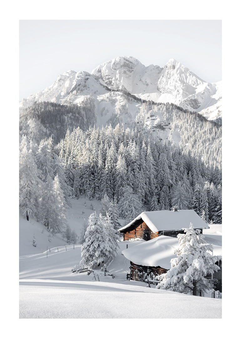 A snow-covered mountain cabin surrounded by frosty trees and majestic mountains that exudes winter idyll and tranquility.-12