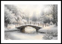 A snow-covered stone bridge spans a frozen stream in a still and magical winter landscape.-0