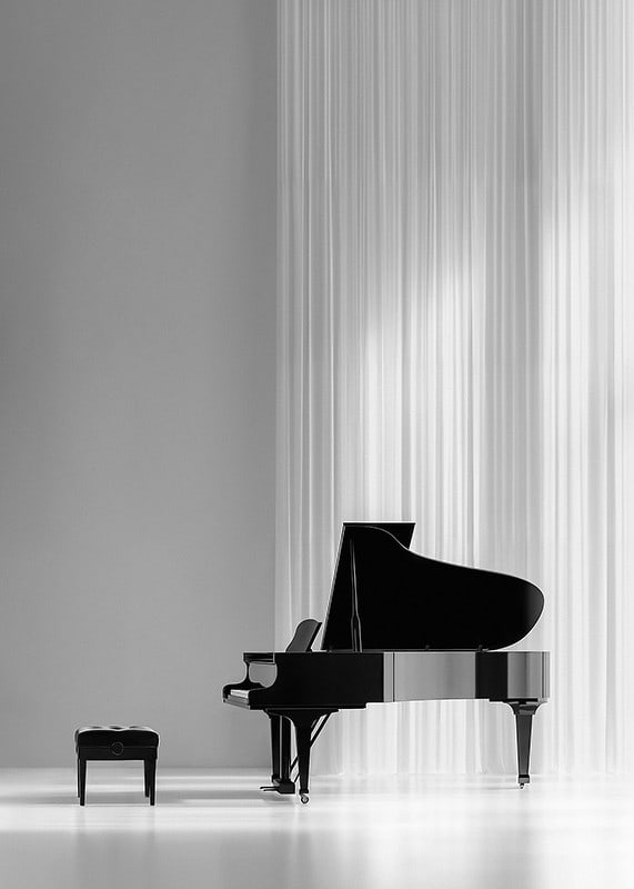 Black and white poster with a photograph of an elegant piano-12