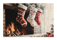 A Christmas poster with decorated Christmas stockings hanging over a cozy crackling fire-1