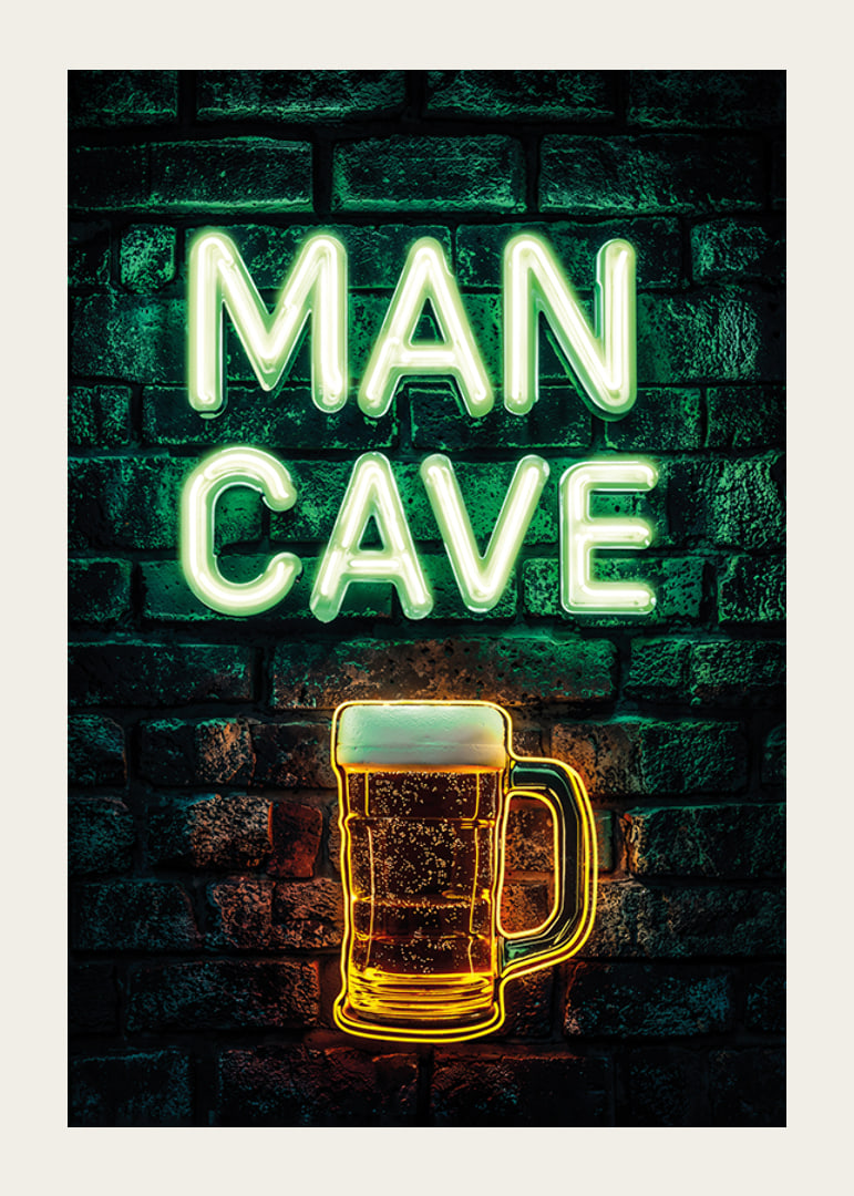 A poster with the neon text "Man Cave" and a glowing beer glass on a rustic brick wall-12