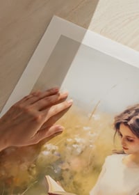 A poster depicting a woman reading in a blooming summer meadow-9