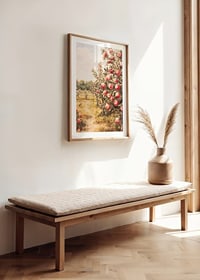 A poster depicting a sunlit apple orchard filled with ripe apples and an inviting path-8