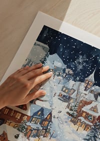 A magical winter scene with snow-covered houses and a starry night-9