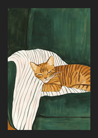 A poster of a sleeping orange tabby cat on a striped blanket in a green armchair-5