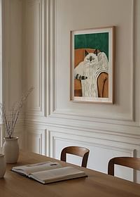 Une affiche d'un chat détendu sur une couverture rayée dans un fauteuil orange-4