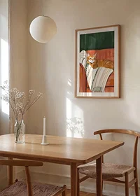 En poster med en orange katt som vilar på en randig filt i en roströd fåtölj-8