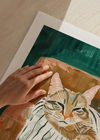 A poster of a relaxed cat in an armchair, spreading warmth and calm in your home-9