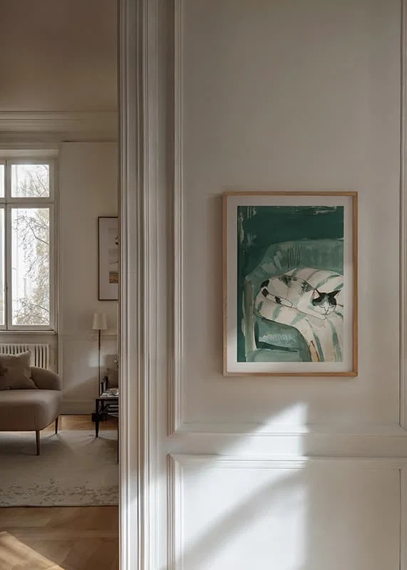 A poster of a sleeping cat in a soft armchair, spreading a calm and cozy atmosphere in your home-12