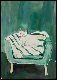 A poster of a white cat in a green armchair, giving the room a modern and artistic touch-6