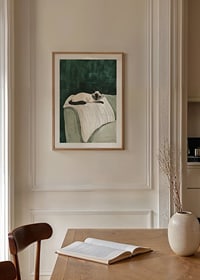 A poster of a Siamese cat resting on a striped blanket-8