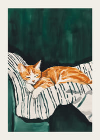 Plagát spiacej oranžovej mačky na pruhovanej deke-3