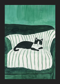 A stylish poster of a black and white cat sleeping on a striped blanket-5