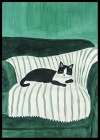 A stylish poster of a black and white cat sleeping on a striped blanket-6
