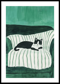 A stylish poster of a black and white cat sleeping on a striped blanket-0