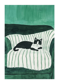 A stylish poster of a black and white cat sleeping on a striped blanket-1