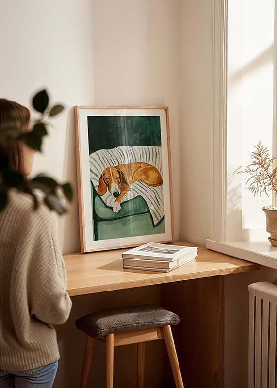 En poster som föreställer en sovande hund på en randig filt-12