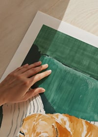 A poster of a sleeping dog on a striped pillow-9