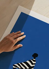 A poster of a stylized figure in black and white stripes against a bright blue background-9