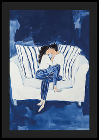 A poster capturing an intimate moment of a couple in a warm embrace on the couch-4