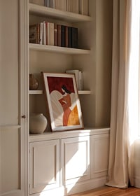 A poster of a woman in a striped dress reading a book -8